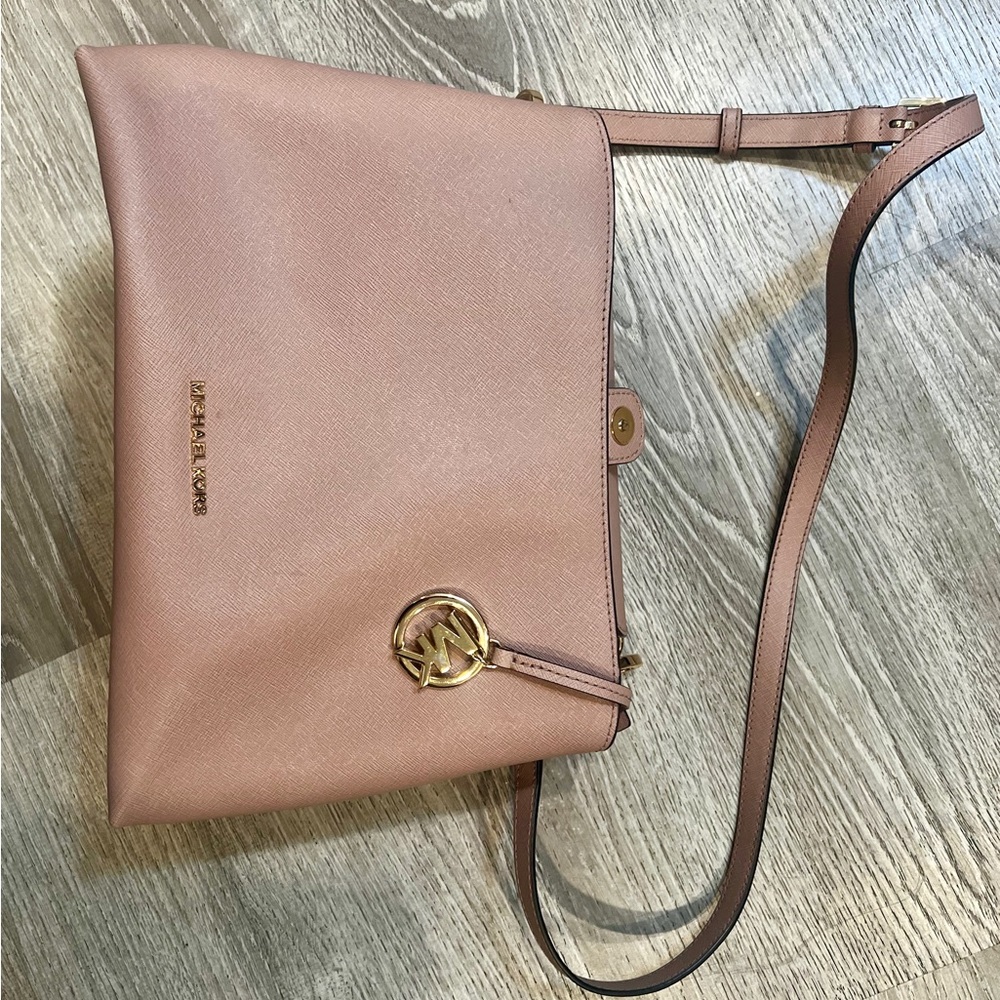 Michael Kors Pink Crossbody Bag with Adjustable Strap and Gold Hardware